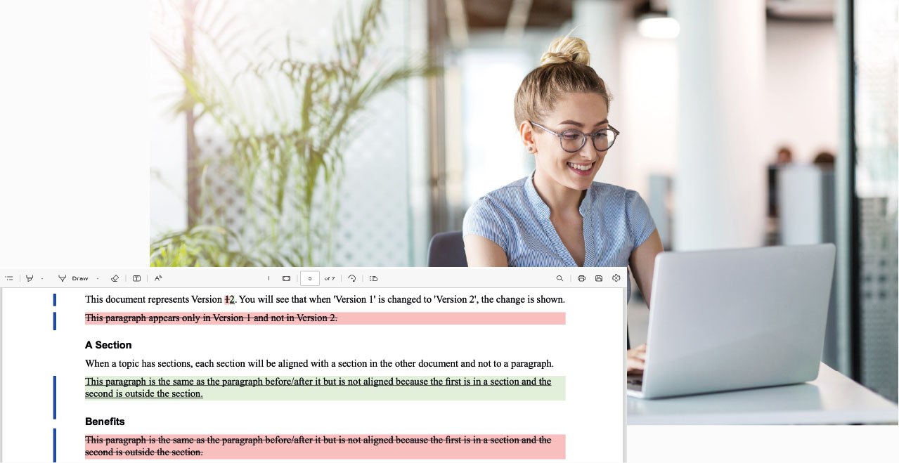 Woman at computer reading DITA results